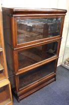 A Globe Wernicke three tier glazed bookcase on base, makers printed labels, 86cm