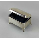 A George V silver jewellery box rectangular shape on four cabriole paw feet, Chester 1920, gross