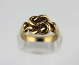 A 9ct gold ring in a bead and interwoven design, London 1984, ring size Q 1/2, 6.1g