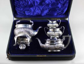 An Edward VII silver four piece tea set, maker Lee & Wigfull, Sheffield 1903, comprising kettle on
