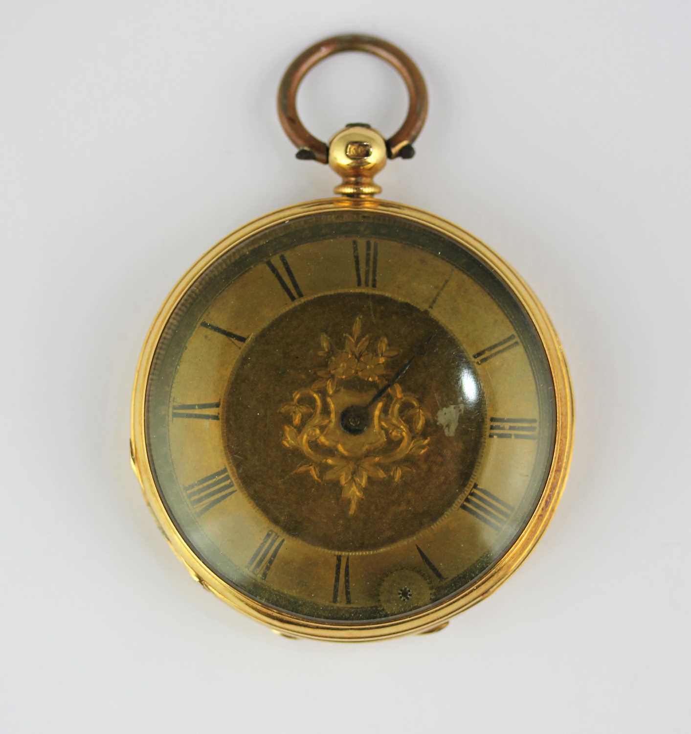 A gold cased key wind open faced ladies fob watch with an unsigned movement, base metal inner