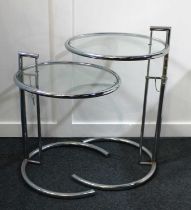 A pair of Modernist style chrome and glass side tables after Eileen Gray, E1027 model, circular form