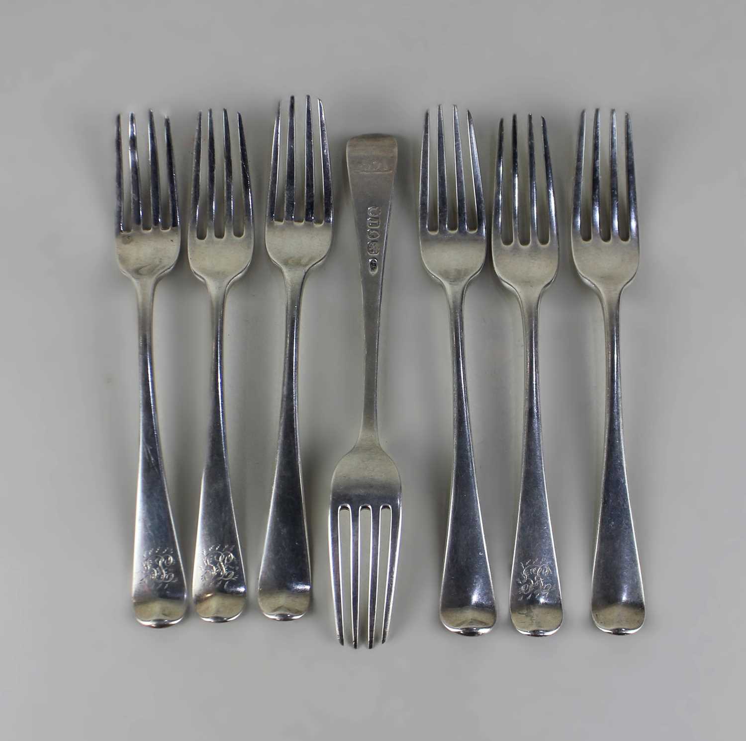 Seven George III silver dessert forks with engraved initials, three by William Sumner, London