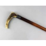 A silver mounted walking stick engraved 'Mr Wills', with antler handle 80cm high