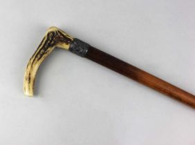 A silver mounted walking stick engraved 'Mr Wills', with antler handle 80cm high