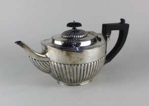 A George V silver tea pot oval demi reeded form, maker Harrods Ltd, Sheffield 1926, gross wt 18oz,