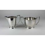 An Art Deco silver milk jug and matching sugar bowl, Roberts & Dore Ltd, Birmingham 1939, 15.6 oz