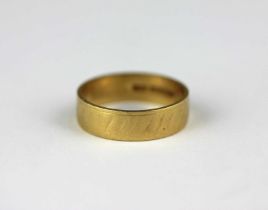 An 18ct gold decorated wedding ring, London 1961, ring size M 1/2, 3.7g