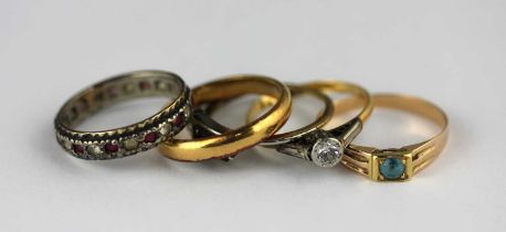 A 22ct gold plain wedding ring, Chester 1940, ring size N 1/2, 4.2g, a gold and pale blue gemset