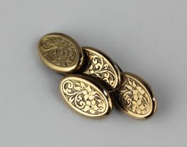 A pair of Victorian 9ct gold cufflinks, the oval backs and fronts with floral engraved decoration,