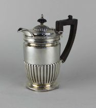 A Victorian silver hot water jug circular demi reeded form (a/f) maker Walker and Hall, Sheffield