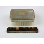 An Elizabeth II silver backed brush, maker B & Co, Birmingham 1970, and a silver backed comb