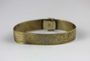 A gold bracelet with floral and foliate decoration to the textured surface on a snap clasp