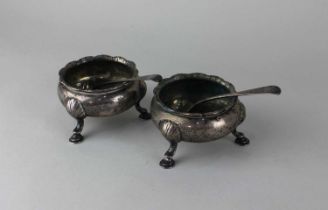 A pair of George III silver salts cauldron form on three shell and hoof feet, maker Robert