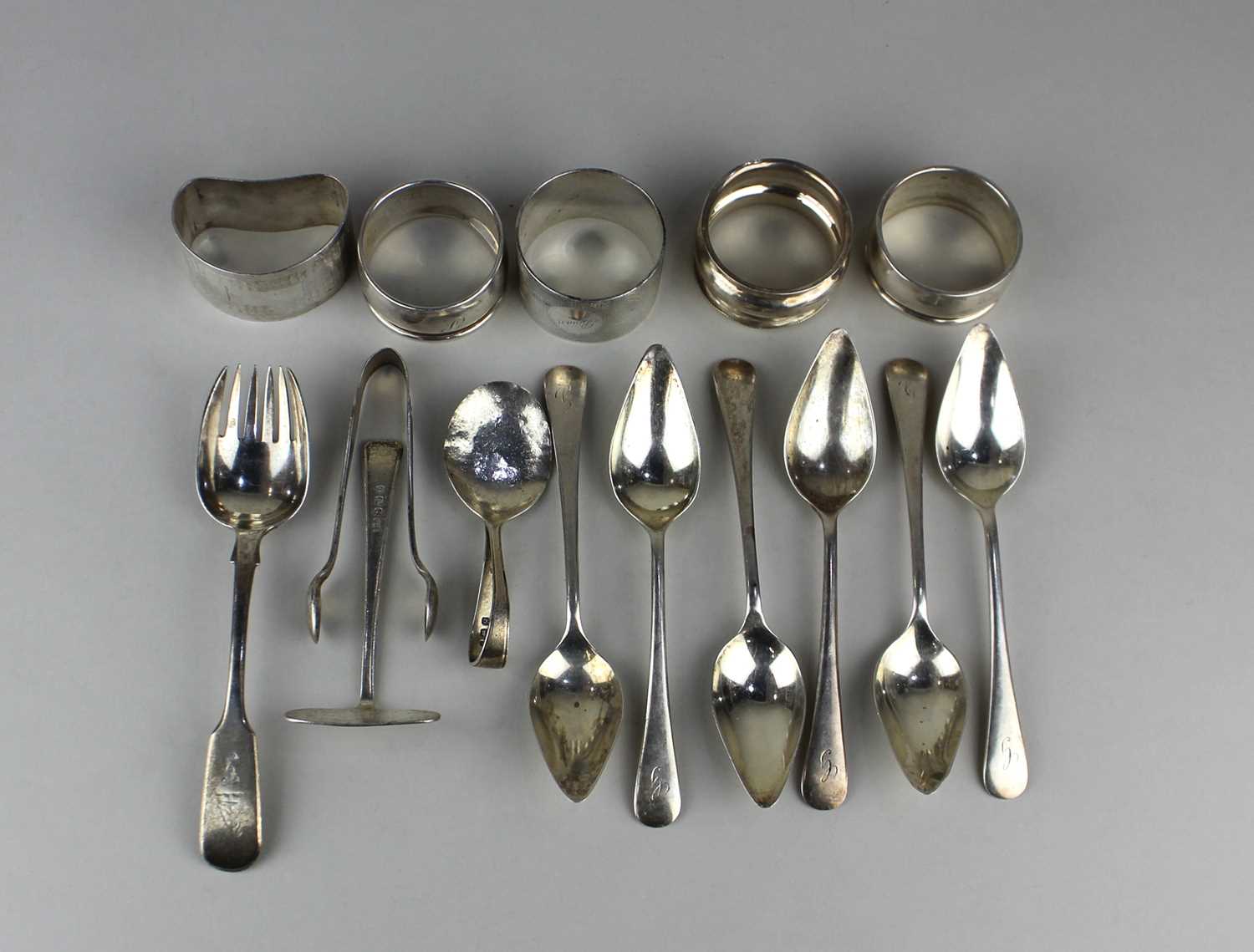 A set of six George VI silver grapefruit spoons Birmingham 1937, a Victorian silver cake fork,