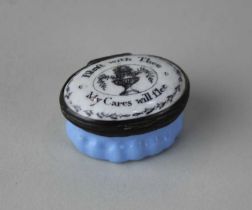 A blue and white enamel patch pot with lid inscribed 'Bleft with Thee..My Cares will flee', 4cm
