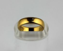 A 22ct gold plain wedding ring, London 1963, ring size J, 7.9g