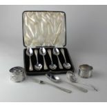 A cased set of six Hanoverian pattern teaspoons maker Barker Bros., Birmingham 1935, two silver