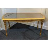 A giltwood and gesso coffee table the rectangular mirror top enclosed by a frieze moulded in