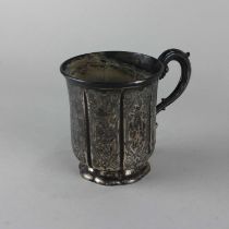 A Victorian silver christening mug fluted and engraved decoration with scroll handle, engraved