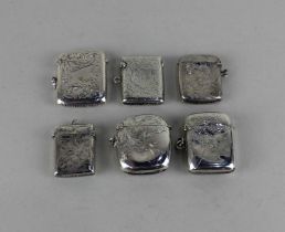 Six assorted silver vesta cases with engraved decoration, 3.9oz