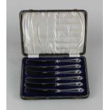 A cased set of six George V silver butter knives maker Charles Wilkes, Birmingham 1924