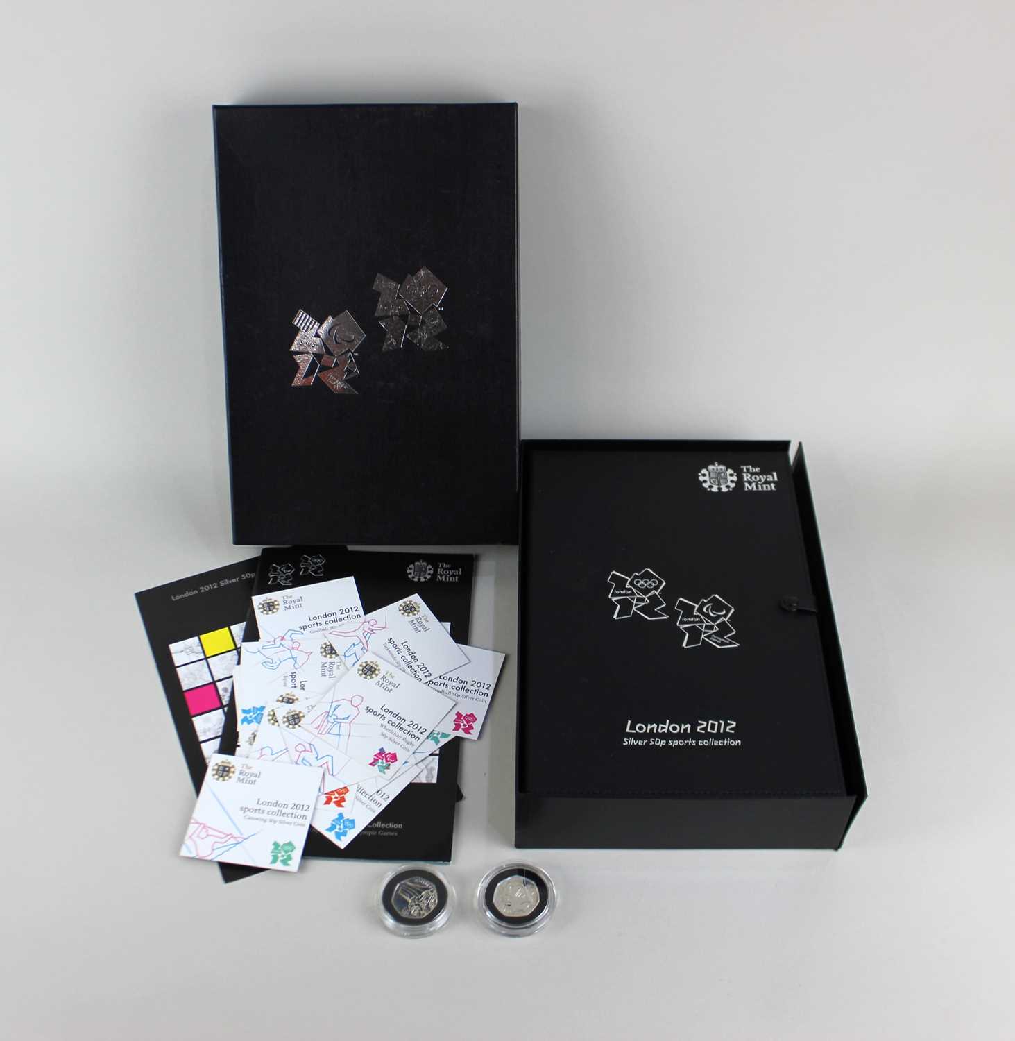A Royal Mint London 2012 Silver 50p Sports Collection presentation case containing twenty eight