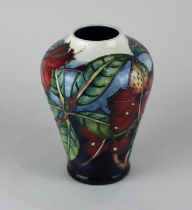 A Moorcroft pottery 'Simeon' pattern vase designed by Philip Gibson 22cm high