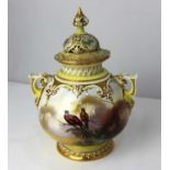 A Royal Worcester Hadley ware porcelain vase and cover painted by William Powell, the bulbous body