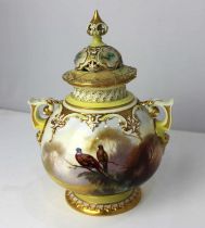 A Royal Worcester Hadley ware porcelain vase and cover painted by William Powell, the bulbous body