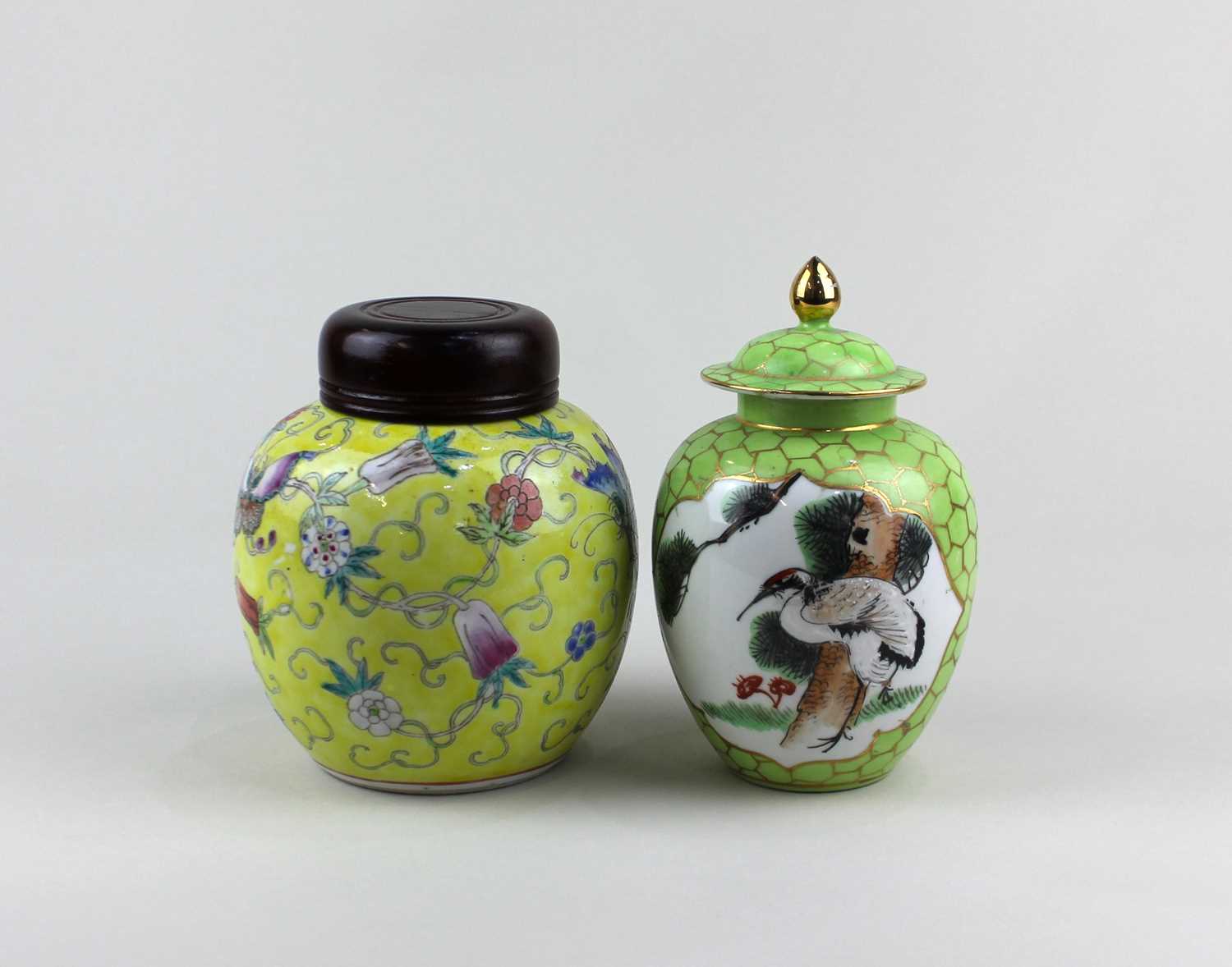 A Chinese ginger jar decorated with butterflies and flowers on yellow ground, character marks to