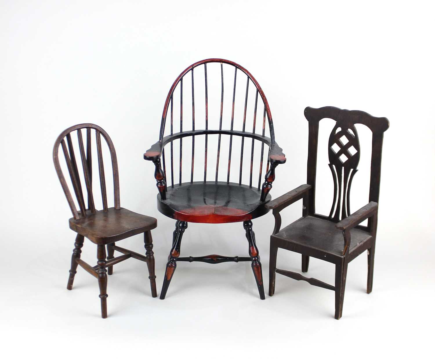 Three miniature models of chairs to include a Windsor chair 38cm high and a Chippendale style carver