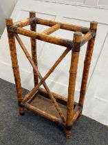 A Victorian Aesthetic bamboo stick stand with brass caps and corner mounts and metal tray (a/f),