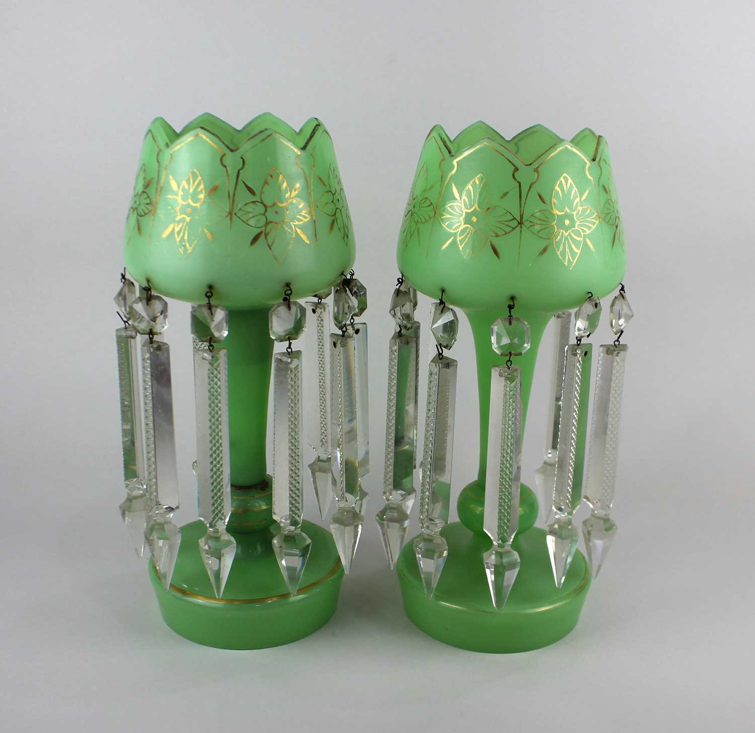 A pair of green glass table lustres with gilt decoration and crystal drops 33cm high (a/f)