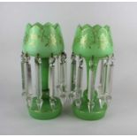 A pair of green glass table lustres with gilt decoration and crystal drops 33cm high (a/f)