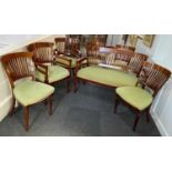 An Edwardian seven-piece drawing room suite of settee, two armchairs and four chairs, with inlaid