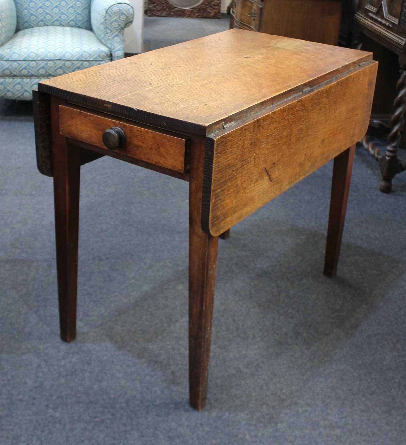 An oak Pembroke table with drawer on square tapered legs 89cm