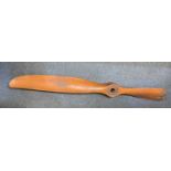 An early 20th century Avro 504 wooden two-blade propeller indistinctly numbered 'V80 80 HP **** TYPE