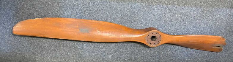 An early 20th century Avro 504 wooden two-blade propeller indistinctly numbered 'V80 80 HP **** TYPE