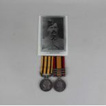 A British South Africa Company medal Rhodesia 1896 and a Queens South Africa medal with three