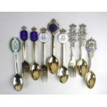 A collection of nine Danish enamelled silver-gilt Royal Commemorative spoons, including examples