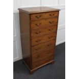 A mahogany narrow chest of seven graduated drawers on bracket feet 119cm wide by 59cm high