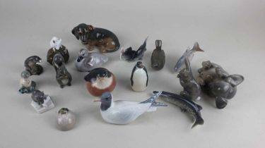 A collection of seventeen Royal Copenhagen porcelain models to include birds, fish and dogs