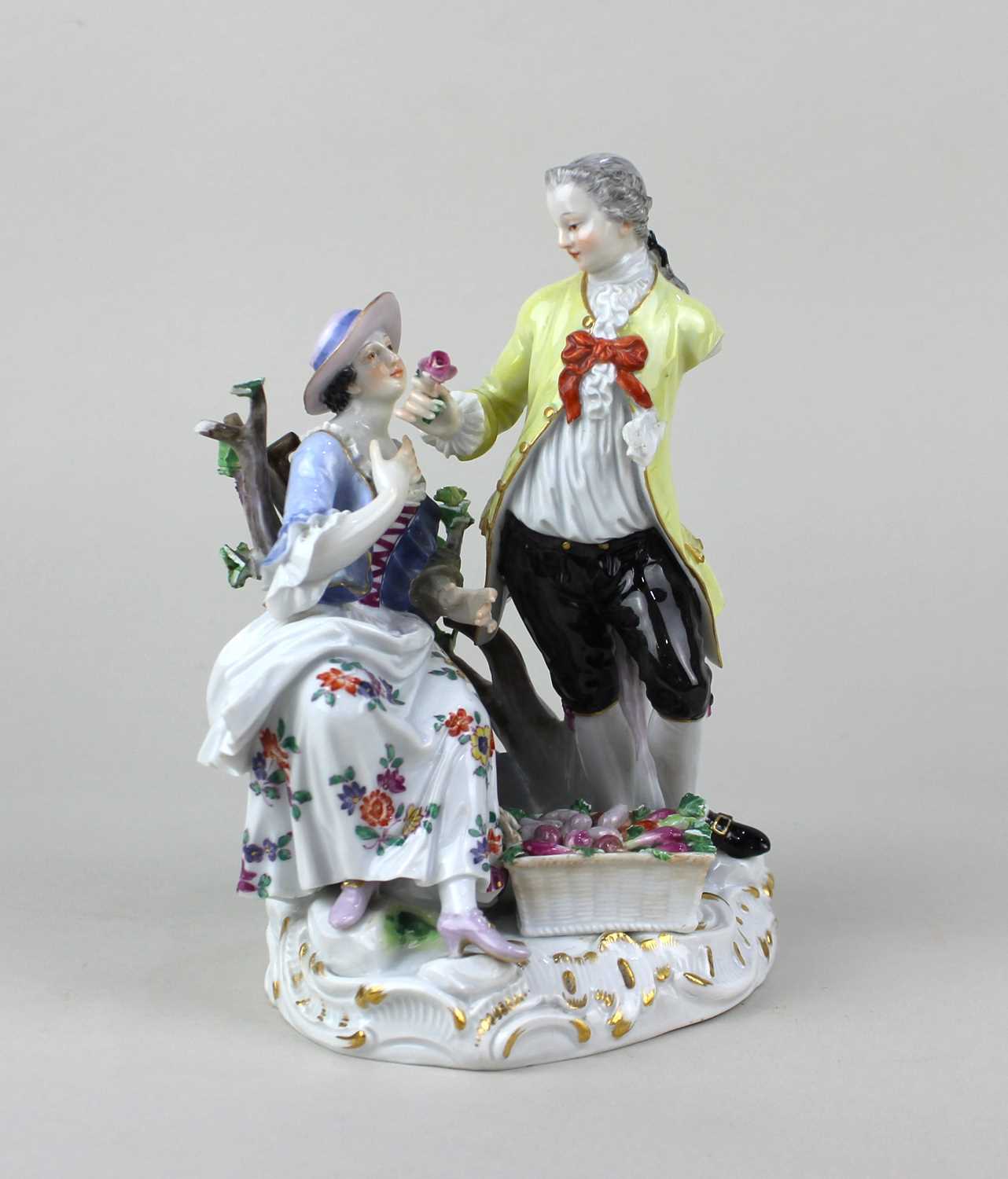 A Meissen porcelain figure group of a gardener and his companion, numbered 1584, 18cm high (a/f)