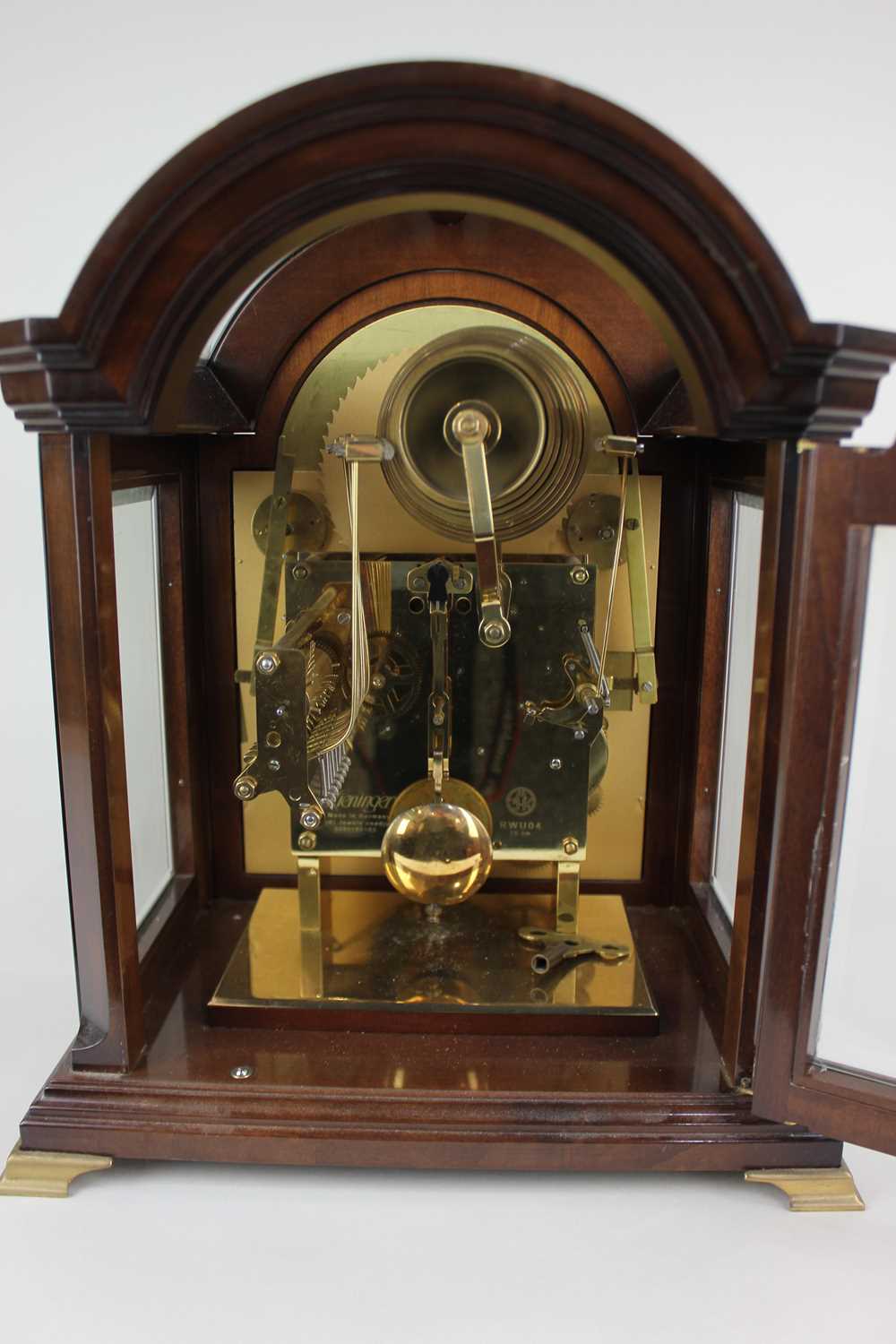 A Kieninger mahogany mantle clock with moon phases, seconds dial, calendar aperture with eight - Image 5 of 6