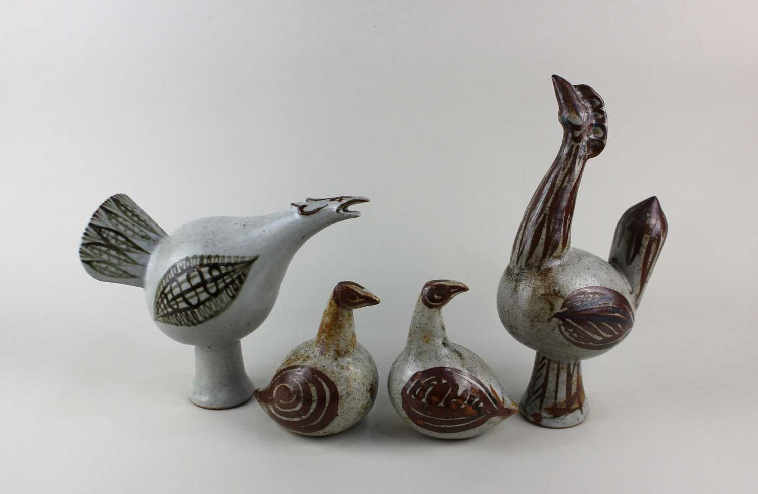 William Ruscoe (1904-1990), a collection of four studio pottery birds comprising two doves and two