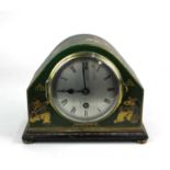 A Chinoiserie decorated green lacquered mantle clock, c.1900 / 1920, with Astral movement, raised on