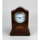 A small Edwardian mahogany mantle clock the circular enamel dial with Roman numerals 16.5cm high