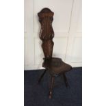 A carved oak spinning chair, possibly Welsh