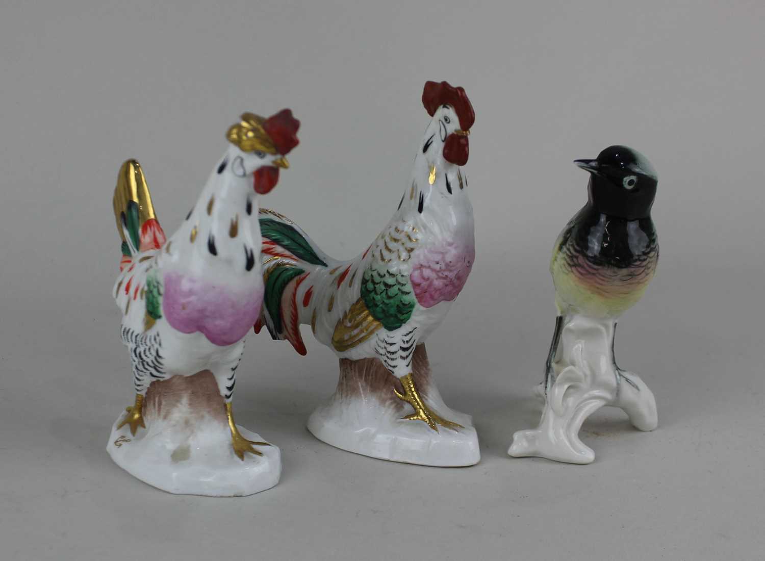 A porcelain pair of cockerel and hen with gilt highlights 14cm and a Karl Ens porcelain model of a